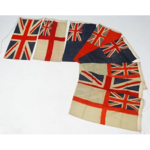 371 - Militaria : A string of eight mid-20thC Royal Navy Standards and Union Flags , probably from a WWII ... 