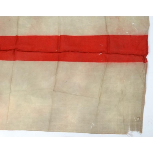 372 - Militaria : A large mid-20thC British Royal Navy White Ensign flag , probably from a WWII vessel , a... 