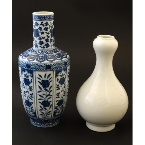 405 - A white Chinese Sauntouping (garlic head) bottle vase, having blue 6 character mark to base, togethe... 