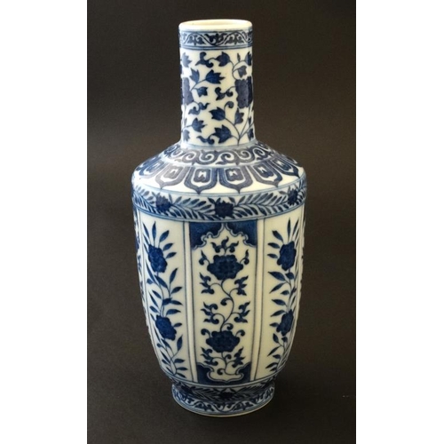 405 - A white Chinese Sauntouping (garlic head) bottle vase, having blue 6 character mark to base, togethe... 