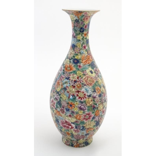 406 - A Chinese Millefiori Yuhuchunping vase, decorated in polychrome with a plethora of flowers, bears bl... 