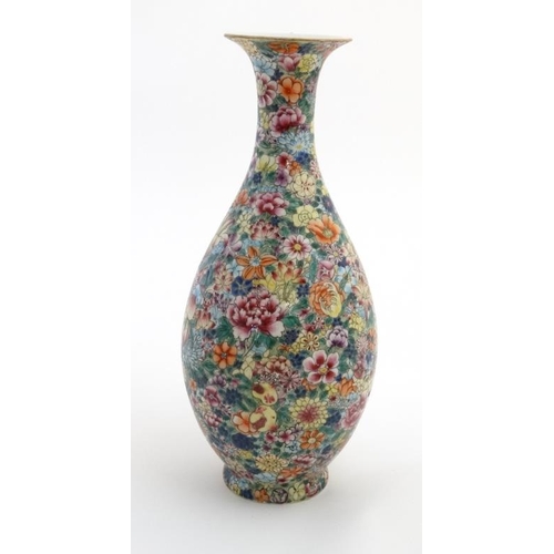 406 - A Chinese Millefiori Yuhuchunping vase, decorated in polychrome with a plethora of flowers, bears bl... 