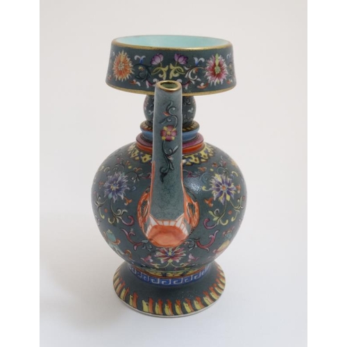 418 - A Chinese lidded wine decanter , having decorative dragon spout , the body decorated in polychrome w... 