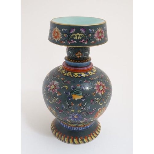 418 - A Chinese lidded wine decanter , having decorative dragon spout , the body decorated in polychrome w... 