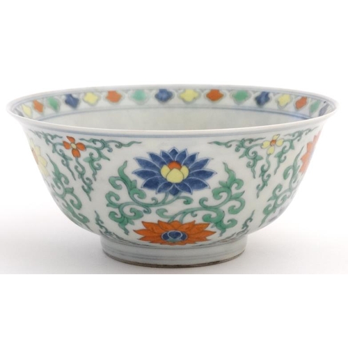 419 - A Chinese Wucai bowl decorated with stylised chrysanthemum among scrolling leaves, bears blue Chines... 