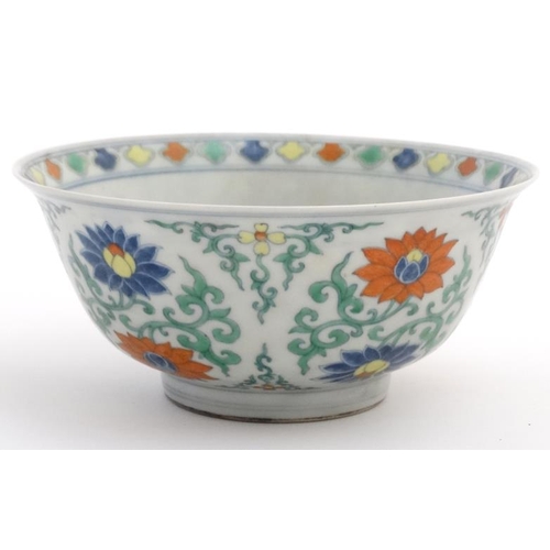 419 - A Chinese Wucai bowl decorated with stylised chrysanthemum among scrolling leaves, bears blue Chines... 