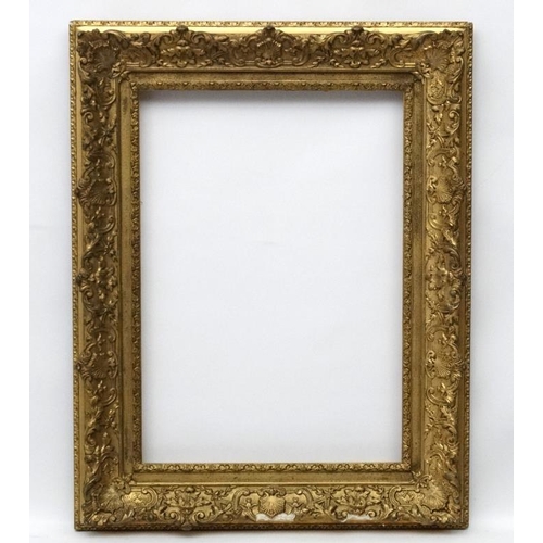 72 - Gilt frame : an ornate XIX gilded gesso and wood frame having internal measurements 23 3/4 x 16 3/4'... 