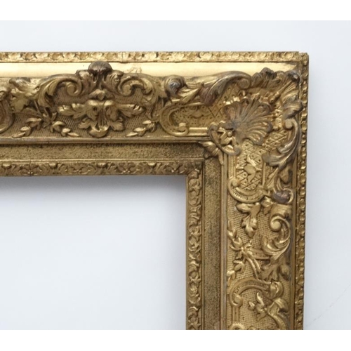 72 - Gilt frame : an ornate XIX gilded gesso and wood frame having internal measurements 23 3/4 x 16 3/4'... 