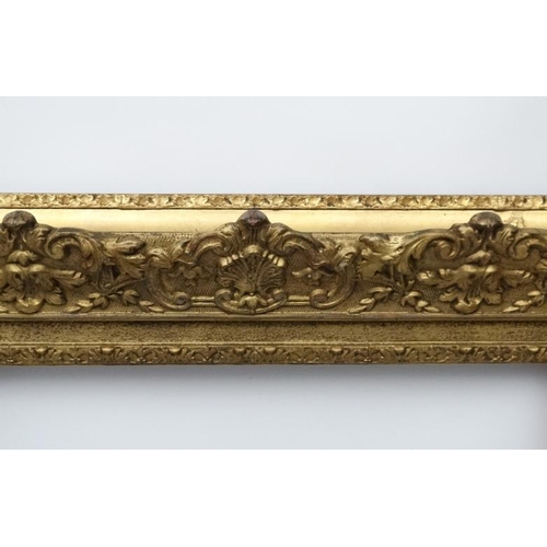 72 - Gilt frame : an ornate XIX gilded gesso and wood frame having internal measurements 23 3/4 x 16 3/4'... 