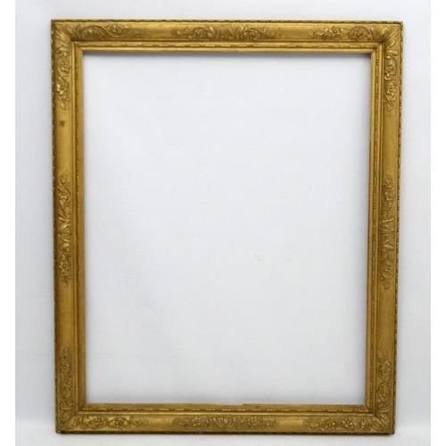 73 - Gilt frame : an ornate XIX gilded gesso and wood frame having internal measurements 48 1/2 x 39 1/4'... 