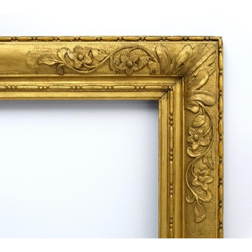 73 - Gilt frame : an ornate XIX gilded gesso and wood frame having internal measurements 48 1/2 x 39 1/4'... 