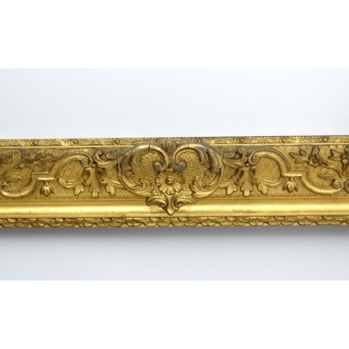 74 - Gilt frame : a large ornate XIX gilded gesso and wood frame having internal measurements  55 1/4 x 3... 