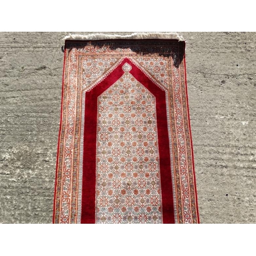 80B - Carpet / Rug : a Persian Machine made Runner , having a central ground of mustard yellow and turquoi... 