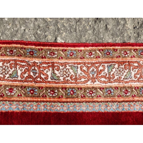 80B - Carpet / Rug : a Persian Machine made Runner , having a central ground of mustard yellow and turquoi... 