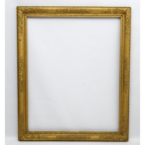 212 - Gilt frame : an ornate XIX gilded gesso and wood frame having internal measurements 48 1/2 x 39 1/4'... 