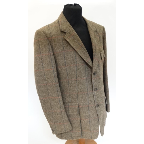 100 - A James Purdey & Sons tweed shooting jacket, approx. 46'' chest measurement.