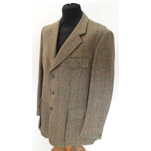 100 - A James Purdey & Sons tweed shooting jacket, approx. 46'' chest measurement.