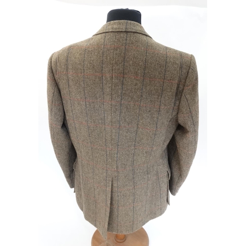 100 - A James Purdey & Sons tweed shooting jacket, approx. 46'' chest measurement.