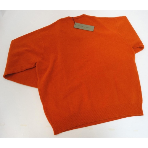 124 - A Laksen Astor knit shooting jumper in orange, size XL, new with tag