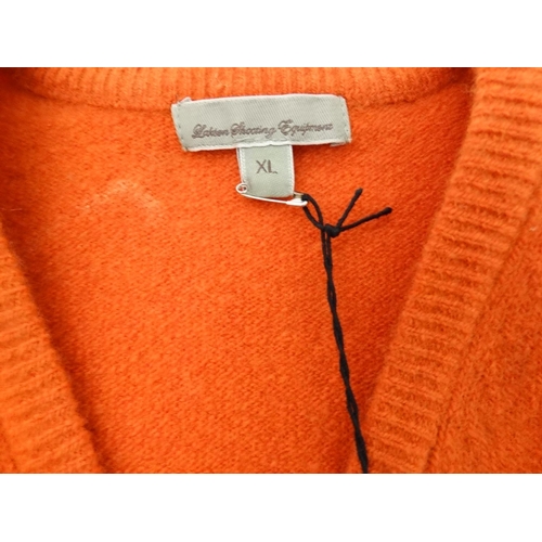 124 - A Laksen Astor knit shooting jumper in orange, size XL, new with tag