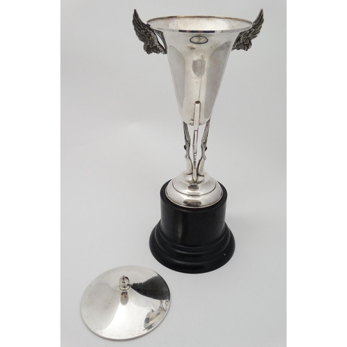 129 - Gibraltar / Military interest : A silver plate trophy cup formed as a lidded urn supported on a trif... 