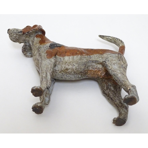 131 - A cold painted bronze figure of a hound / dog. 21stC. 4 3/4'' long