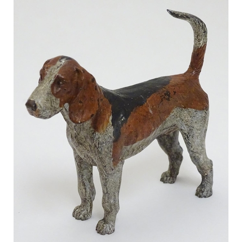 131 - A cold painted bronze figure of a hound / dog. 21stC. 4 3/4'' long