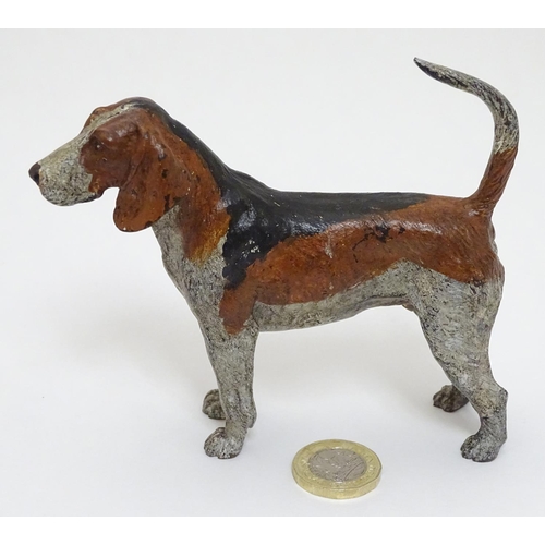 131 - A cold painted bronze figure of a hound / dog. 21stC. 4 3/4'' long