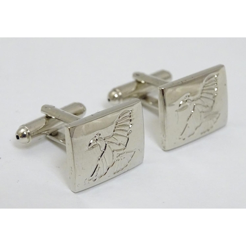 132 - A pair of silver plate cufflink with Pheasant decoration by Laksen. Cased