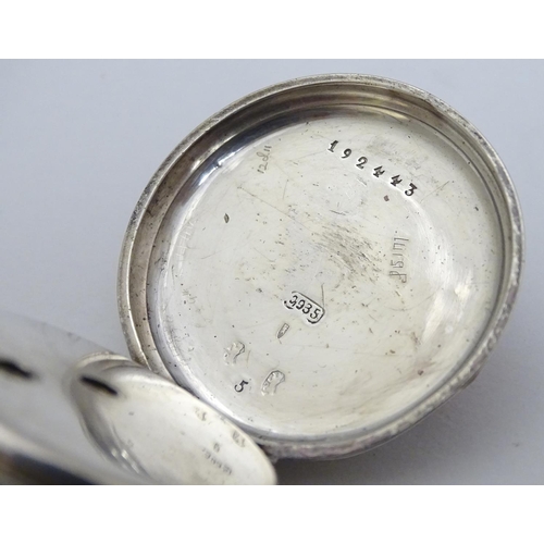 133 - A Continental silver pocket / fob watch , the enamel dial with floral decoration and signed ' H Samu... 