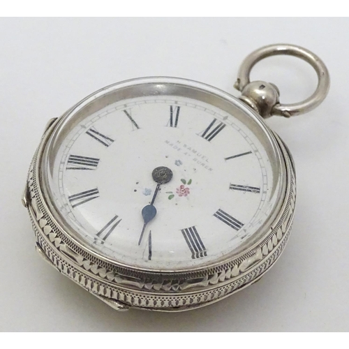 133 - A Continental silver pocket / fob watch , the enamel dial with floral decoration and signed ' H Samu... 