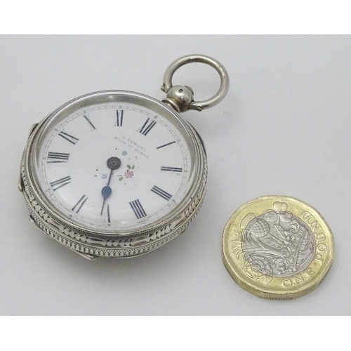 133 - A Continental silver pocket / fob watch , the enamel dial with floral decoration and signed ' H Samu... 