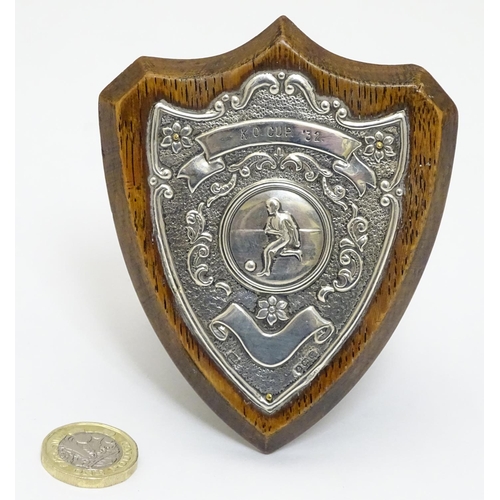 138 - Football Interest : A silver mounted oak presentation / trophy shield titled ' K. O Cup '32' depicti... 