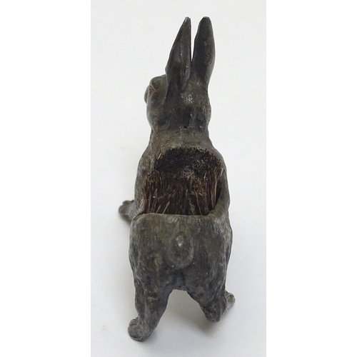 144 - A Victorian Novelty pen wipe formed as a cast model of a hare with red painted eyes and bristles to ... 