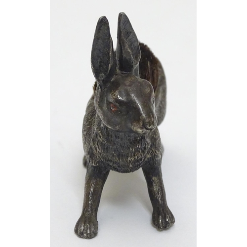 144 - A Victorian Novelty pen wipe formed as a cast model of a hare with red painted eyes and bristles to ... 