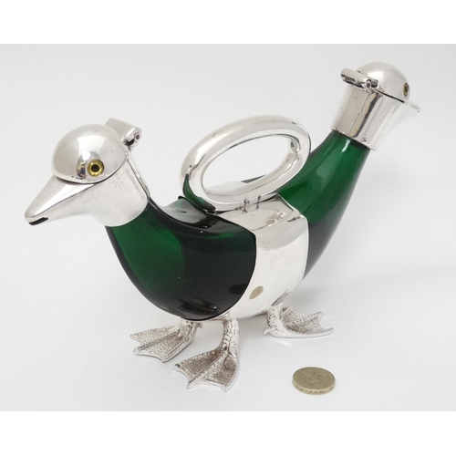 148 - A 21stC novelty double ended small duck claret jug of green glass and silver plate , 6'' high x 10 3... 