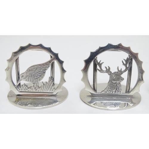 149 - A set of 12 ( 6+6) silver menu / table place card holders decorated with snipe, partridge, duck, sta... 