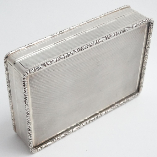 152 - An Art Deco silver desk / table top cigarette box hallmarked Birmingham 1932 maker A Wilcox, having ... 