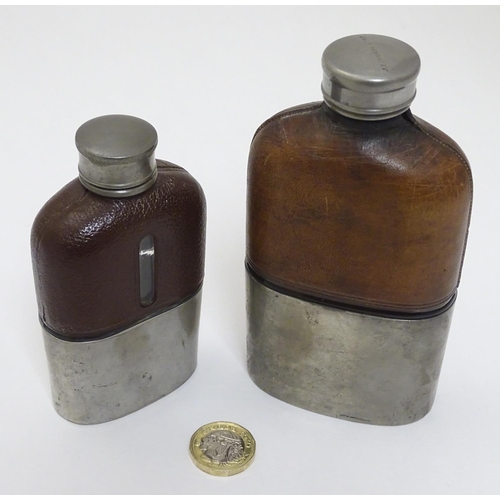 153 - A half leather covered hip flask with beaker to lower half. Marked G & JW Hawksley 5 1/4'' high. Tog... 