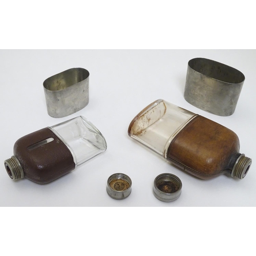 153 - A half leather covered hip flask with beaker to lower half. Marked G & JW Hawksley 5 1/4'' high. Tog... 