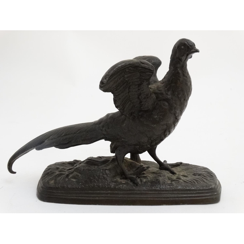 160 - A late 19 thC Spelter figure of a pheasant on an oblong base. 7 3/4'' long x 5 1/4'' high