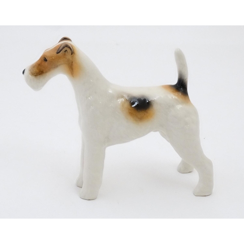 169 - A Beswick model of a wire haired fox terrier dog  , Champion '' Ch. Talavera Romulus '', number 963,... 