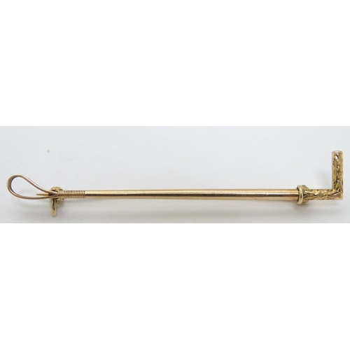 177 - Equine / Horse Riding Interest : A yellow metal stick pin formed as a riding crop / whip 2 1/4'' lon... 