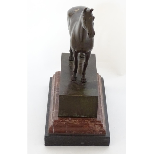 181 - Equine / Hose Racing : A late 20thC bronze model of a horse. Signed ' ANDRE',  mounted upon a marble... 