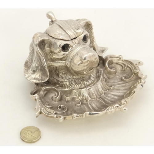 185 - A late 20thC silver plated inkwell / Standish  formed as a dogs head. Approx 2 ¾'' high x  5 ½''