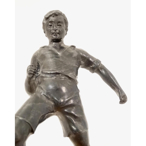 186 - A mid 20thC cast metal model of a footballer? Probably Russian. On wooden base. The whole 6 3/4'' hi... 