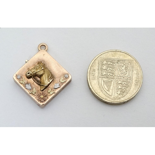 189 - Equine Interest : A yellow metal locket of squared form with horse head floral and foliate decoratio... 