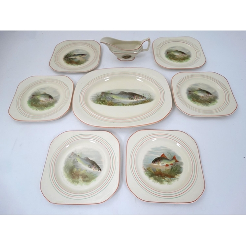 213 - Fishing : a 1930's Woods Ivory Ware ceramic dining set comprising : central large plate , 6 individu... 