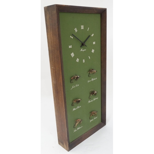 222 - Fly - Fishing : A Monogram battery wall clock with 6 mounted and named Salmon flies , measuring 22''... 