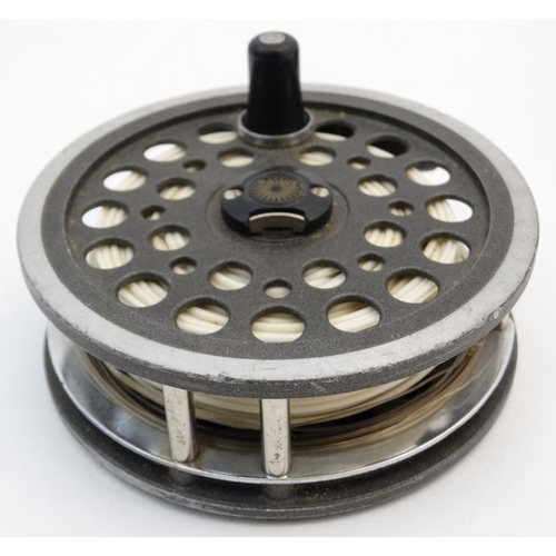 231 - Salmon fishing: A Daiwa 812 4 1/4'' salmon fly reel together with a spare spool and a quantity of un... 